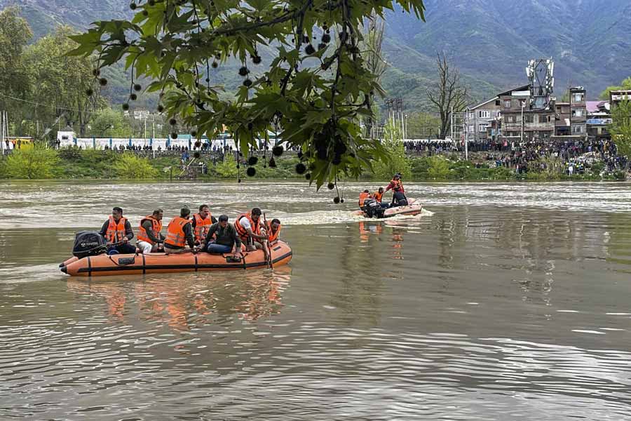 Rescue operation underway after a boat capsized in the Jhelum river, on the outskirts of Srinagar, Tuesday, April 16, 2024.