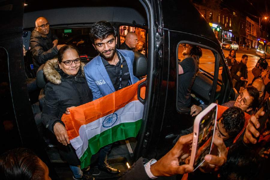 In a picture shared on X, fans click pictures of D. Gukesh in Toronto on Monday
