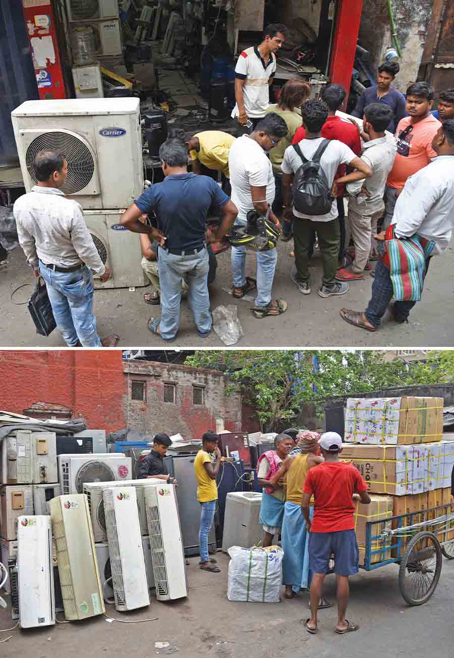 A shop selling and repairing air-conditioners and compressors is doing brisk business at Biplabi Anukul Chandra Street on Tuesday. Second-hand ACs are also in great demand  