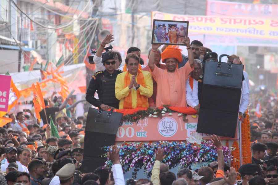 Adityanath at a road show in Meerut on Tuesday.