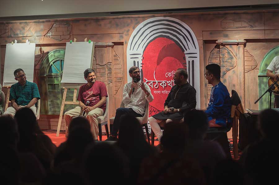 Chandril Bhattacharya (centre) in an ‘adda’ on stage with his Chandrabindoo peers Upal Sengupta (left) and Anindya Chatterjee (right)