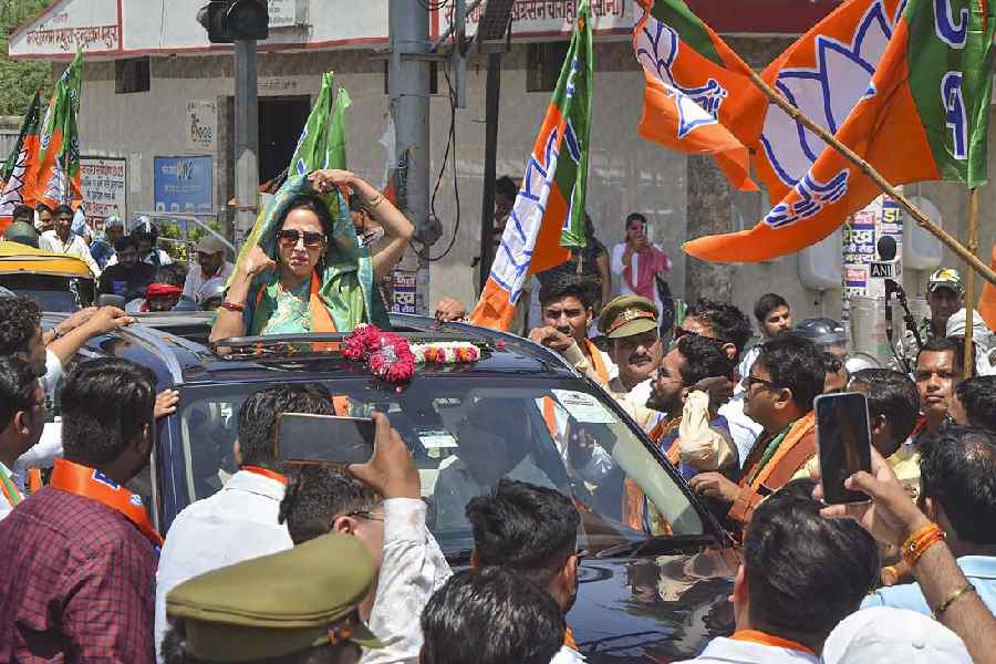 Actress and BJP candidate Hema Malini during a roadshow for Lok Sabha elections in Mathura.