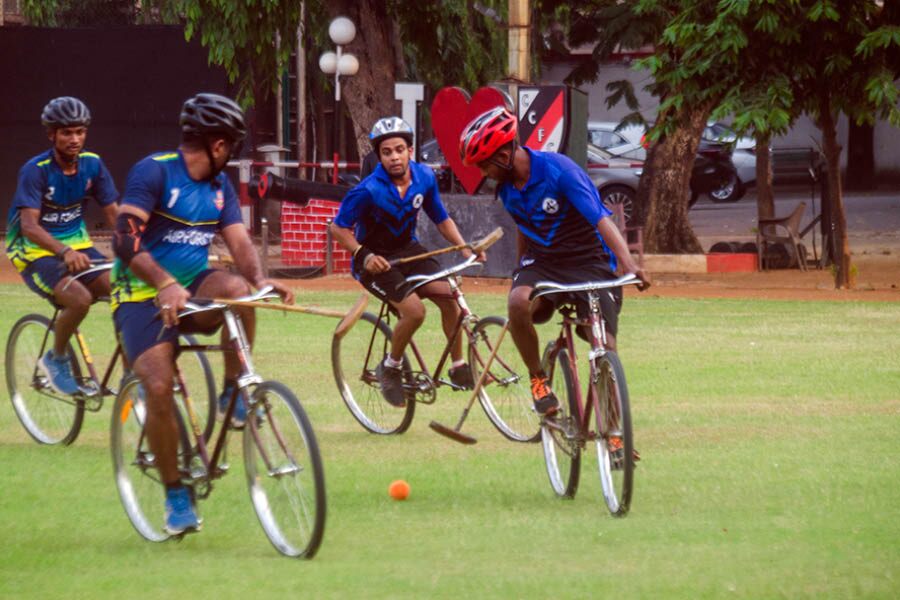 Cycle polo players in action during the All India Cycle Polo Invitation Cup 2024 at the Calcutta Cricket and Football Club.