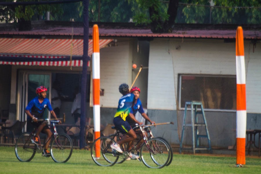 A goal is scored at the All India Cycle Polo Invitation Cup 2024 at the Calcutta Cricket and Football Club.