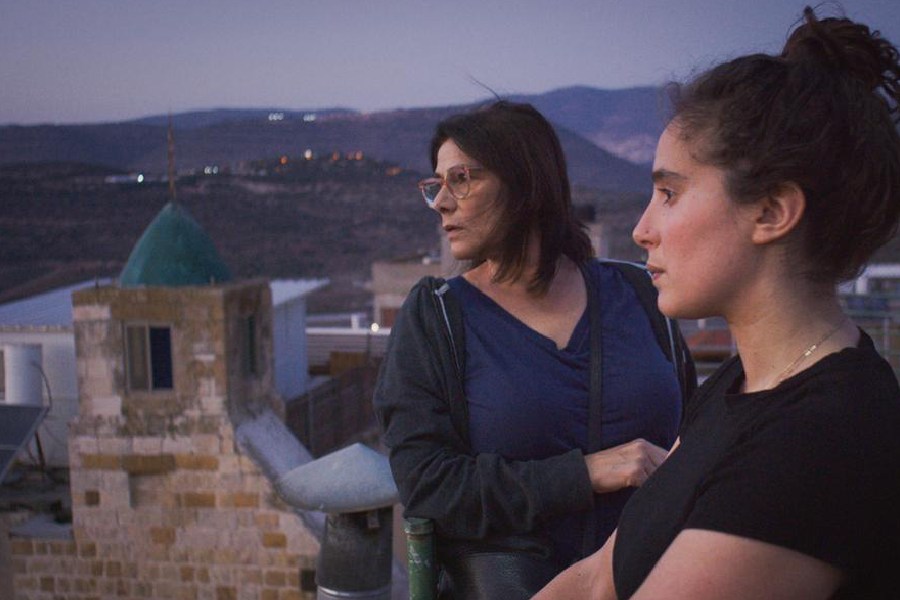 Lina Soulaem (right) with her mother, Palestinian actress Hiam Abbass, in a scene from the documentary 'Bye Bye Tiberias'