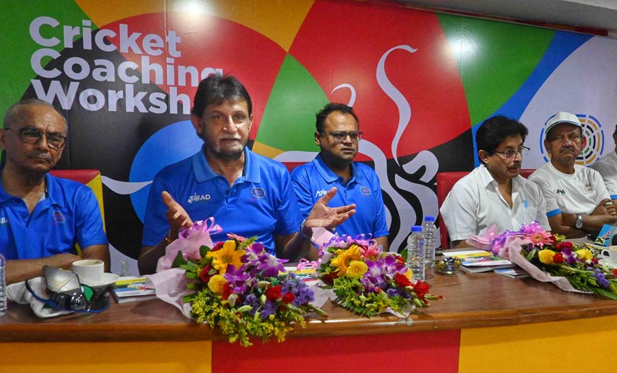 Former Indian cricketer Sandeep Patil addressed the Cricketer Workshop at East Bengal Media Centre Kolkata. (L-R) Omkar Salvi, Mumbai Cricket Association's head coach; Saradindu Mukherjee, former Indian cricketer; Sambaran Banerjee, cricket coach; Snehasish Ganguly, president of CAB; Rahul Todi, co-owner, Shrachi Sports; Sandeep Patil and Dinesh Nanavati, former Indian cricketer  