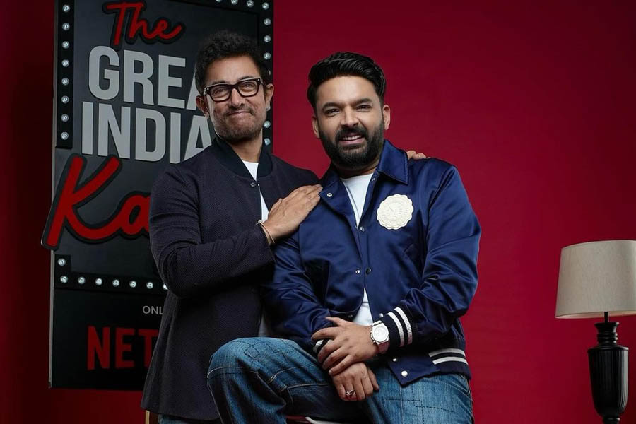 Kapil Sharma with Aamir Khan.