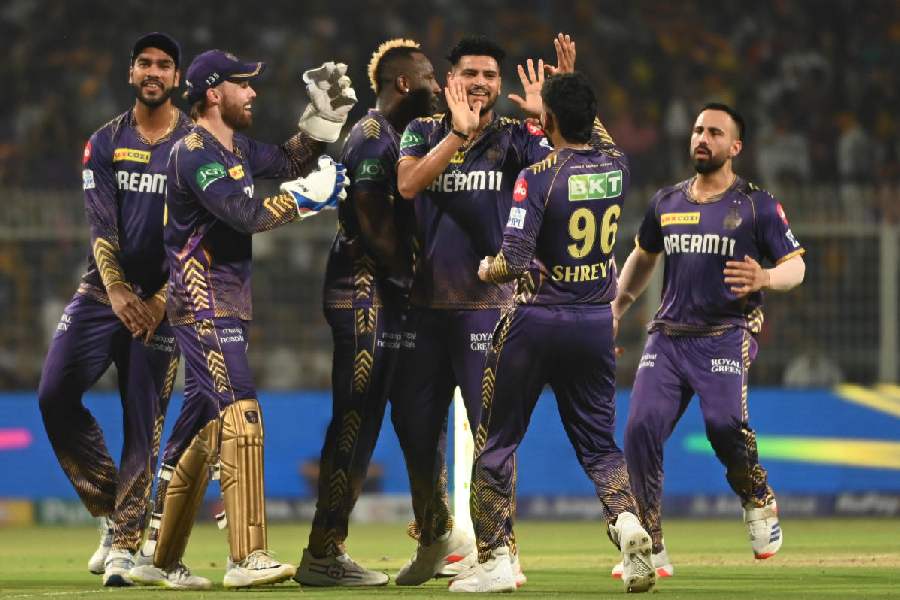The Kolkata Knight Riders players in a celebratory mood after the fall of a Delhi Capitals wicket at Eden Gardens on Monday.
