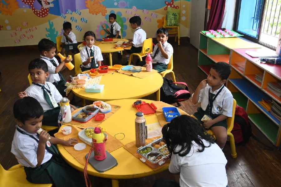 Students enjoy sharing their healthy tiffins with friends at Delhi Public School, Howrah. 