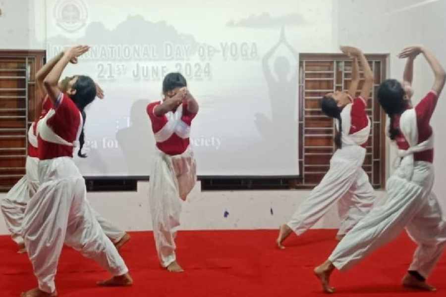 Students present a performance that fuses yoga asanas with dance moves