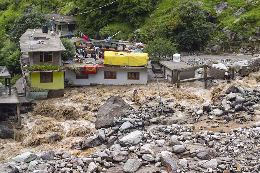 A view of floods at a village following a recent cloudburst, in Kullu district, Thursday, Aug. 1, 2024.
