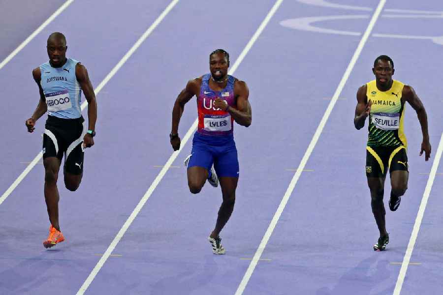 Letsile Tebogo of Botswana, Noah Lyles of United States and Oblique Seville of Jamaica in action