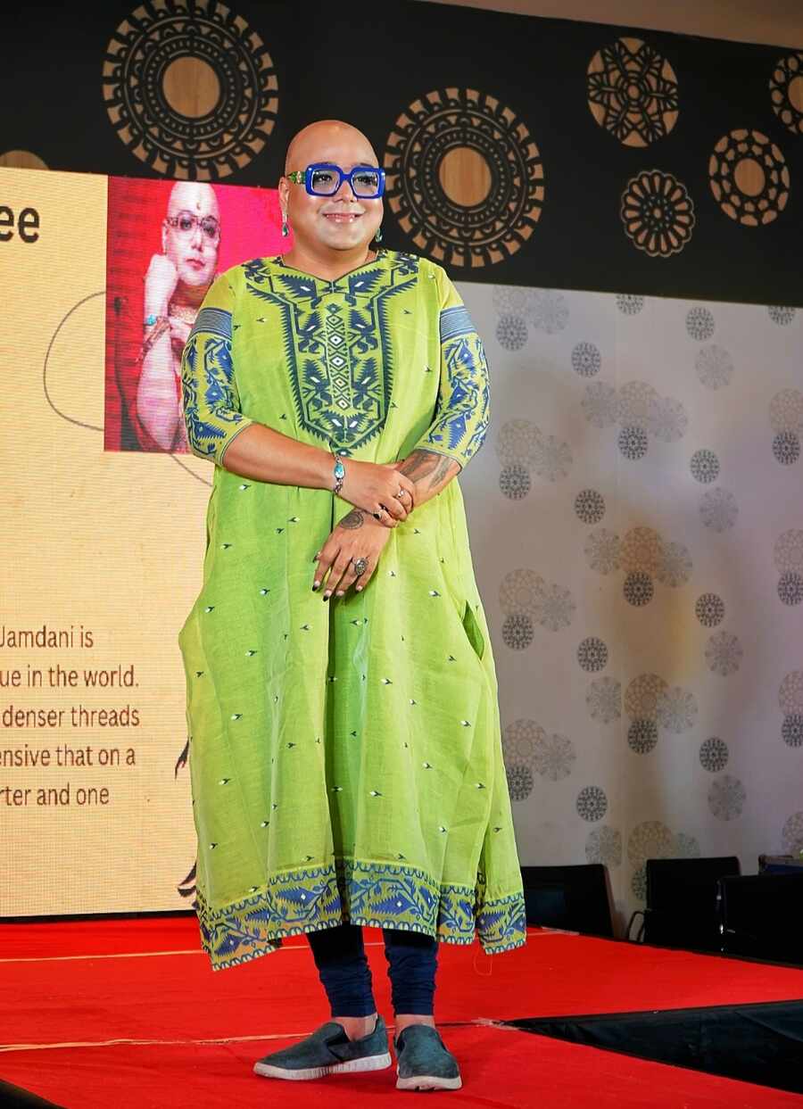 Fashion designer Indroneel Mukherjee looked glamorous in a green Dhakai jamdani kurta