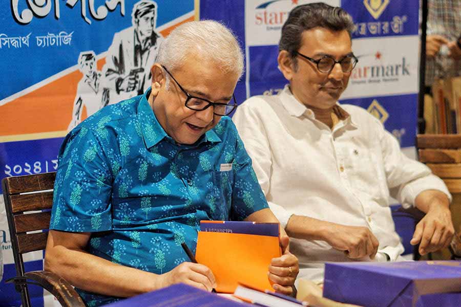 Siddhartha Chatterjee signs copies of the book at the launch in May this year