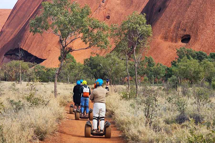 A Segway tour circles the base