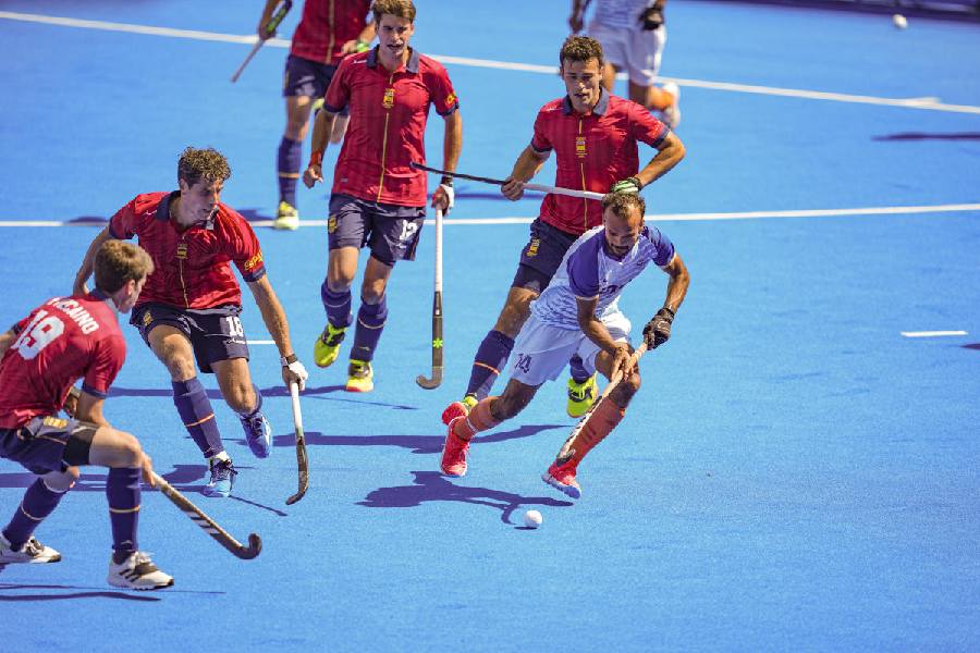 India's Lalit Kumar Upadhyay (14) dribbles during the match