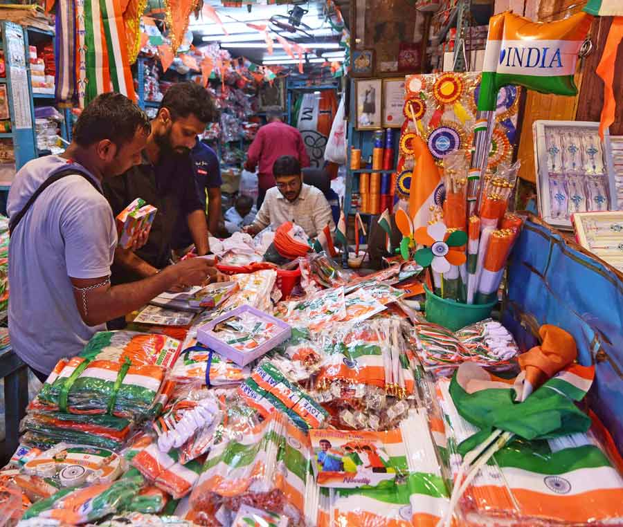 The National Flag in various sizes and other Tricolour-embossed knick-knacks on sale at Old China Bazar Street in Burrabazar ahead of Independence Day  