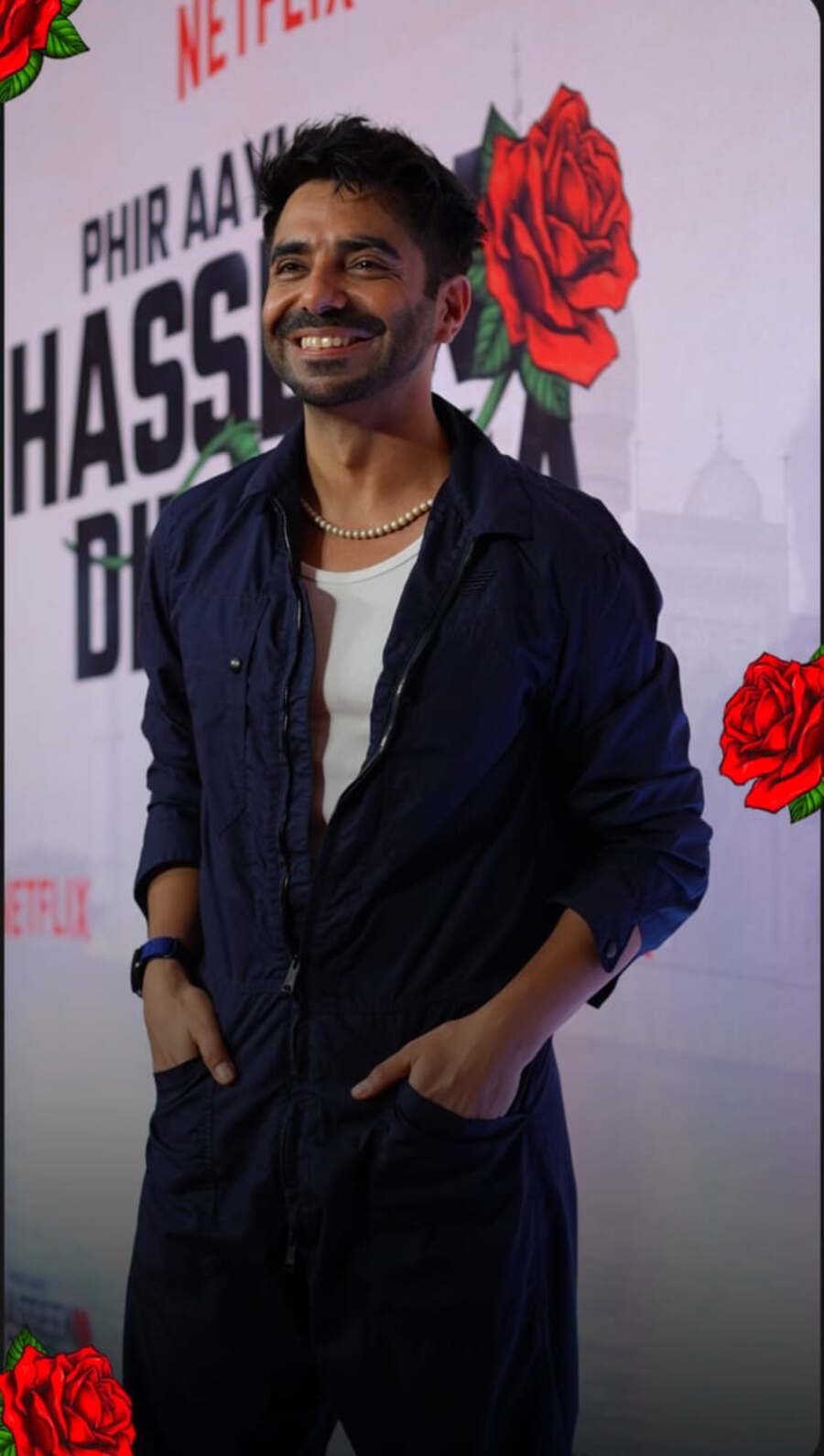 Actor Aparshakti Khurana attended the screening in a blue shirt, white tee and matching pants. The actor, who will be next seen in Stree 2, was all smiles at the photoshoot.