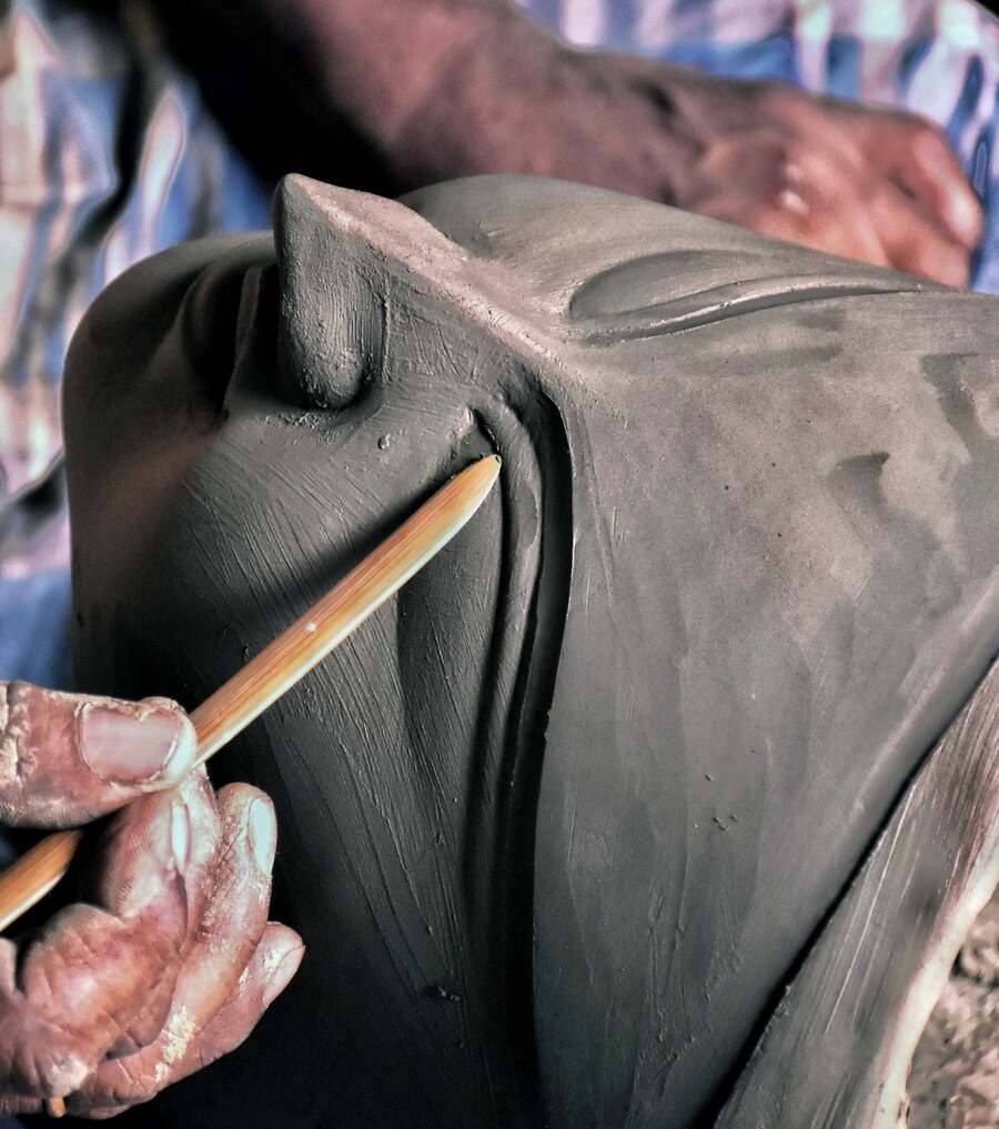The work of making and drying the face of the Durga idol in progress at Krishnanagar Pal Bari. Durga Puja starts on October 9 this year