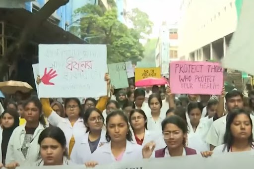 Medical students holding a protest wearing lab coats on Friday
