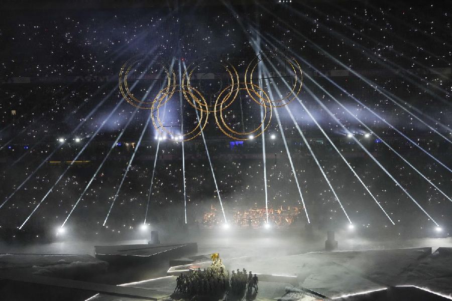 The Olympic rings under the lights during a performance at the closing ceremony of the 2024 Summer Olympics at the Stade de France, in Paris, France, Sunday, Aug. 11, 2024