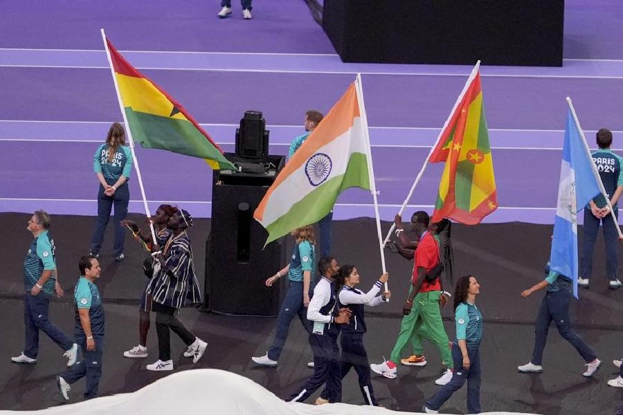 India’s flag-bearers shooter Manu Bhaker and men’s hockey team goalkeeper PR Srejeesh and others during the closing ceremony of the 2024 Summer Olympics at Stade de France, in Paris, France, Sunday, Aug. 11, 2024