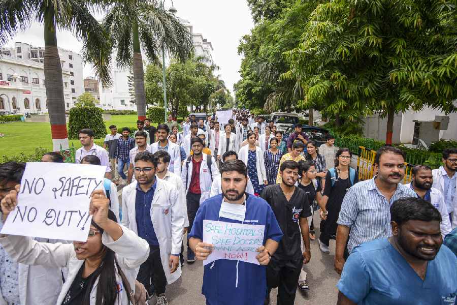 Medical students stage a protest against the sexual assault and murder of a postgraduate trainee doctor in Calcutta, at King George's Medical University, in Lucknow, Monday, Aug. 12, 2024.