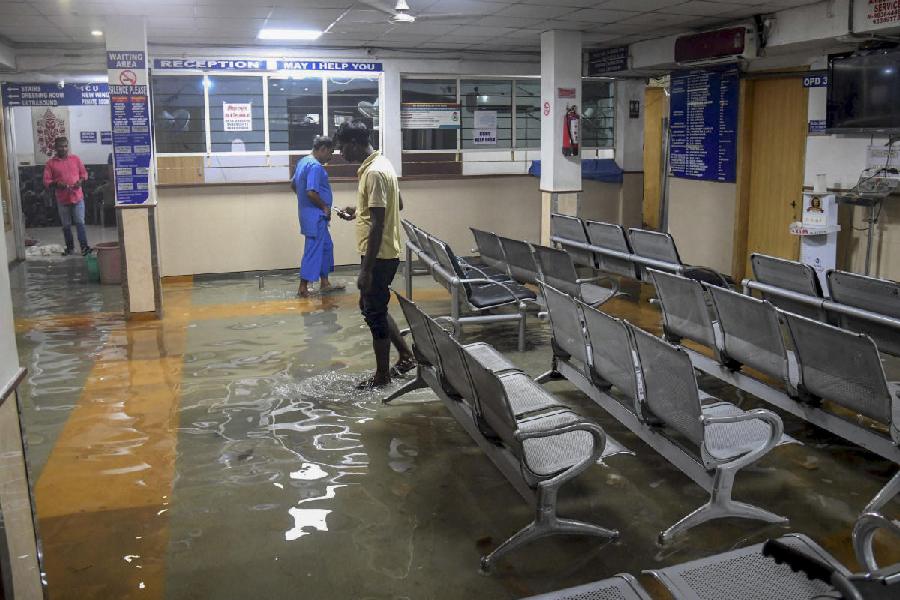 An area inside a hospital is seen inundated with rainwater after heavy rainfall, in Patna