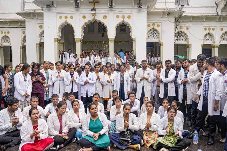 Doctors stage a demonstration against the sexual assault and murder of a postgraduate trainee doctor in Calcutta at King George's Medical University (KGMU), in Lucknow, Tuesday, Aug. 13, 2024