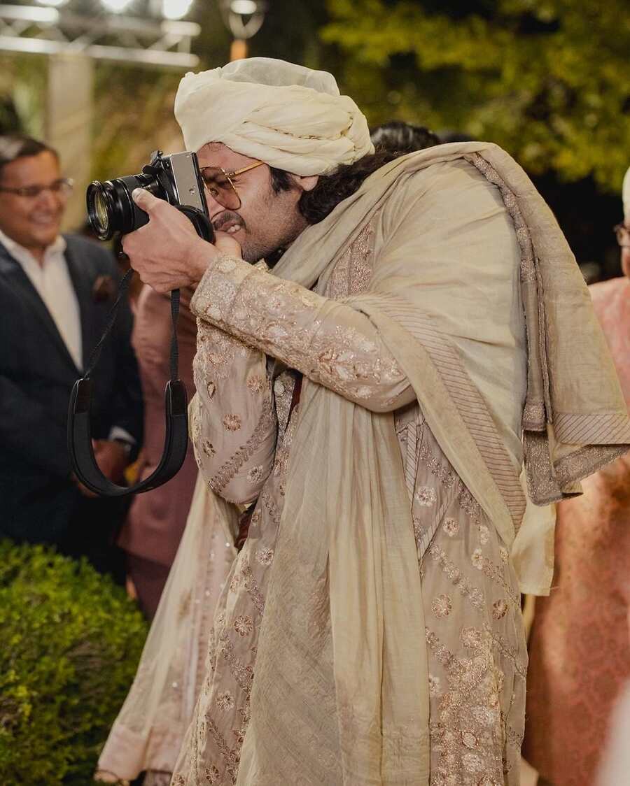 The Mirzapur actor, who sported a Rimple and Harpreet avatari angarkha at the wedding, called himself a “ninja photographer” as he enjoyed “faffing” around with his camera. “I mean I had to really make sure I make their moment for them… ‘Ji ji yeh maine hee’,” he wrote in the caption. At the end of his note, the actor clarified that he had been joking about being a photographer for the couple and that the pictures were taken by the actual wedding photographers.