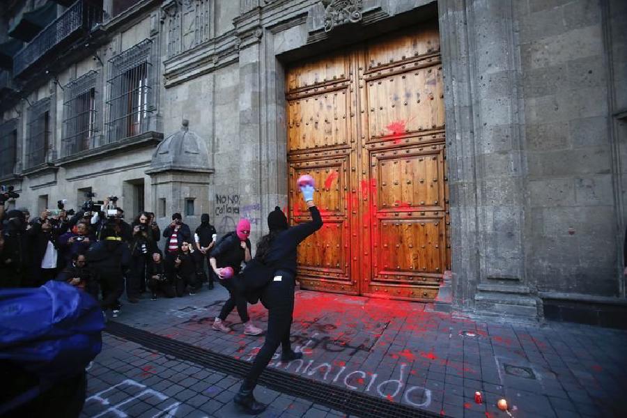 Hundreds in Mexico protest against 'femicide state' at presidential palace after Ingrid Escamilla murder