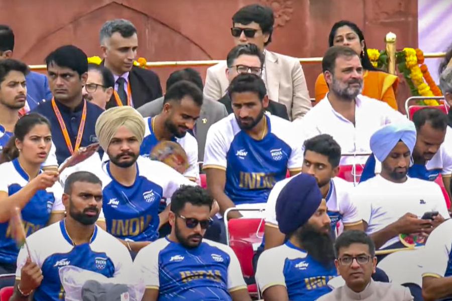 Leader of Opposition in Lok Sabha Rahul Gandhi with the Paris Olympics 2024 medal winning contingent and others during the 78th Independence Day celebration at the Red Fort, in New Delhi, Thursday, Aug. 15, 2024.