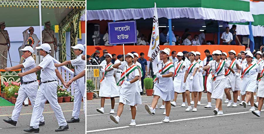 Schoolchildren marched past the main podium where the CM and other dignitaries were seated