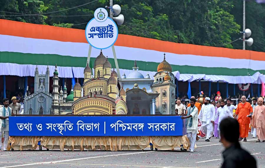 Tableaux of temples, churches and mosques represented communal harmony in the state