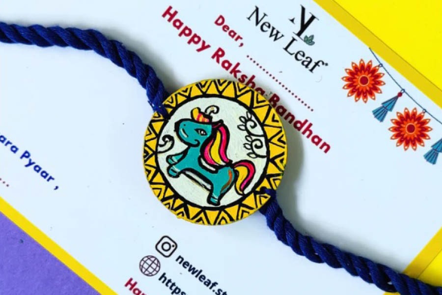 The unicorn hand-painted rakhi from Newleafstore