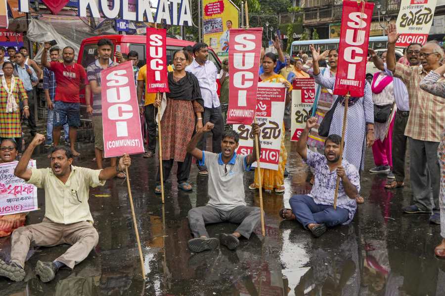 Socialist Unity Centre of India (Communist) (SUCI-C) activists stage a demonstration during their 12-hour general strike against the alleged rape and murder of a woman doctor at R G Kar Medical College and Hospital, in Kolkata, Friday, Aug. 16, 2024.