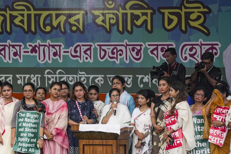 West Bengal Chief Minister and TMC chief Mamata Banerjee along with party leaders and supporters takes part in a protest rally demanding justice for a woman doctor who was allegedly raped and murdered at R G Kar Medical College and Hospital, in Kolkata, Friday, August 16, 2024. 
