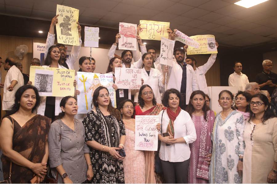 Doctors stage a protest demanding justice for the woman doctor who was allegedly raped and murdered at Calcutta's R G Kar Medical College and Hospital, Noida, Saturday, Aug. 17, 2024.
