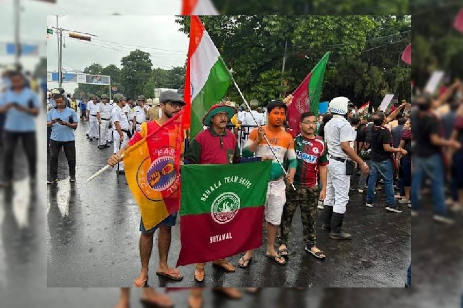 Football fans with their club flags uniting for the justice of the RG Kar rape and murder victim