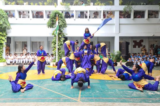 The theme for the 15th was Sri Aurobindo's soul stirring work : Demand Of The Mother, which was elocuted, along with a  hymn and synchronised western and Indian dance.An innovative performance by the French students and wonderful rhythmic Yogasanas were the other homages