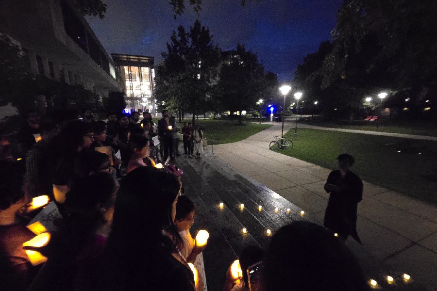 A big candlelight vigil, an iteration of the “Reclaim the Night” protest, in Chicago. 