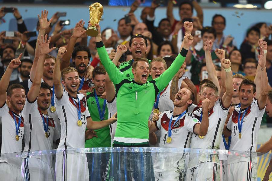 Manuel Neuer celebrates with teammates after winning the World Cup in 2014.
