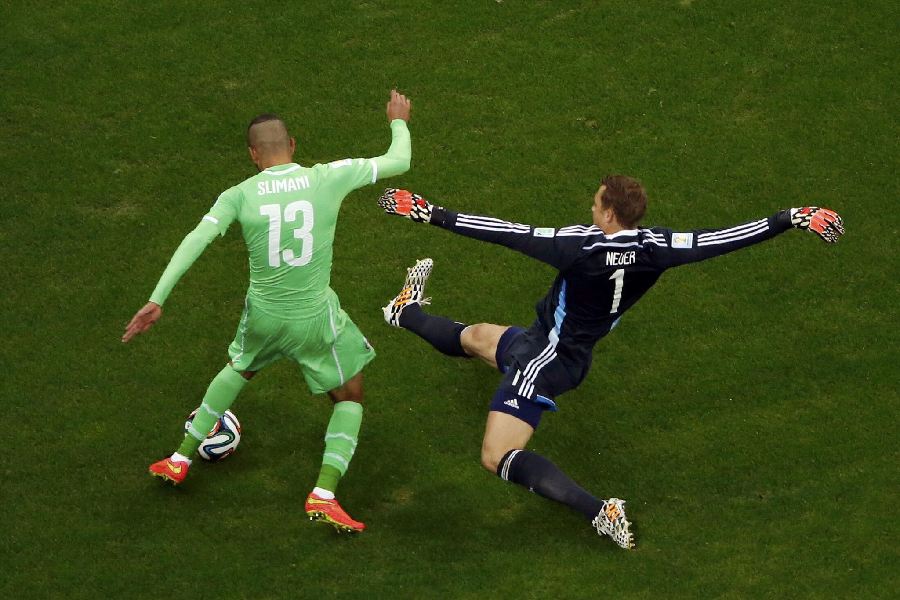 Manuel Neuer in action against Algeria in 2014 FIFA World Cup Round of 16