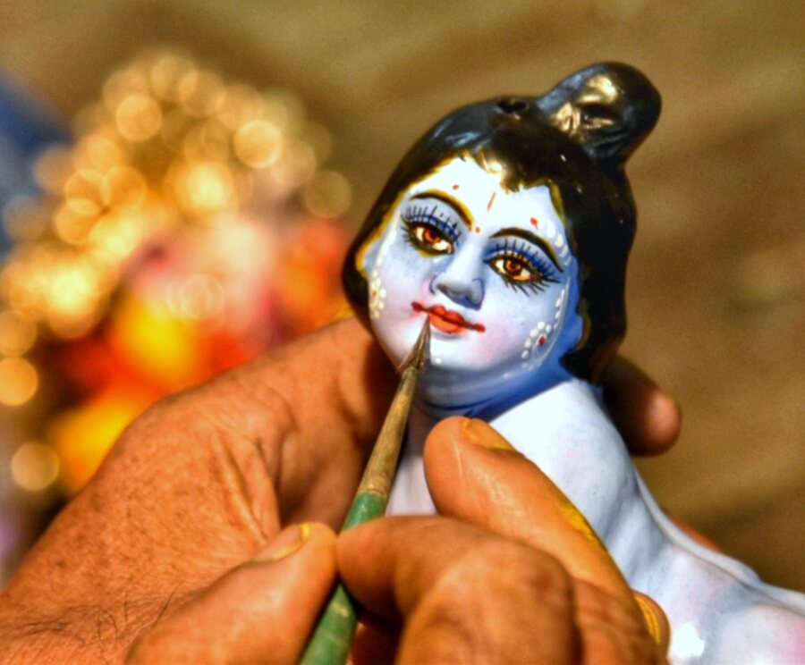 An artist lends finishing touches to an idol of Gopal ahead of Janmashtami. It falls on August 26 this year