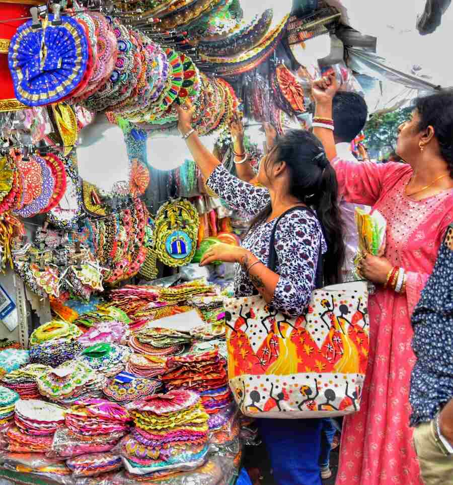A roadside stall on Bidhan Sarani near Shyambazar on Friday sells puja paraphernalia three days ahead of Janmashtami