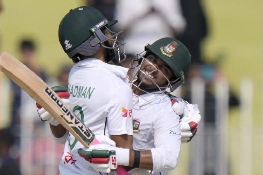 Bangladesh’s Zakir Hasan (right) and Shadman Islam celebrate after winning the first Test against Pakistan in Rawalpindi on Sunday