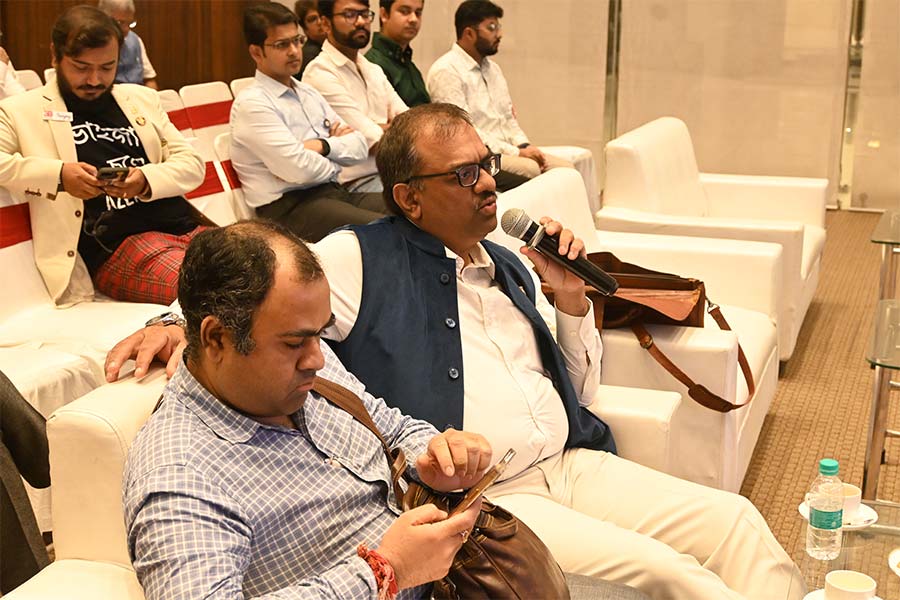 Avishek Auddy, the chairman of Bengal Business Council, interacts with the speakers and audience members