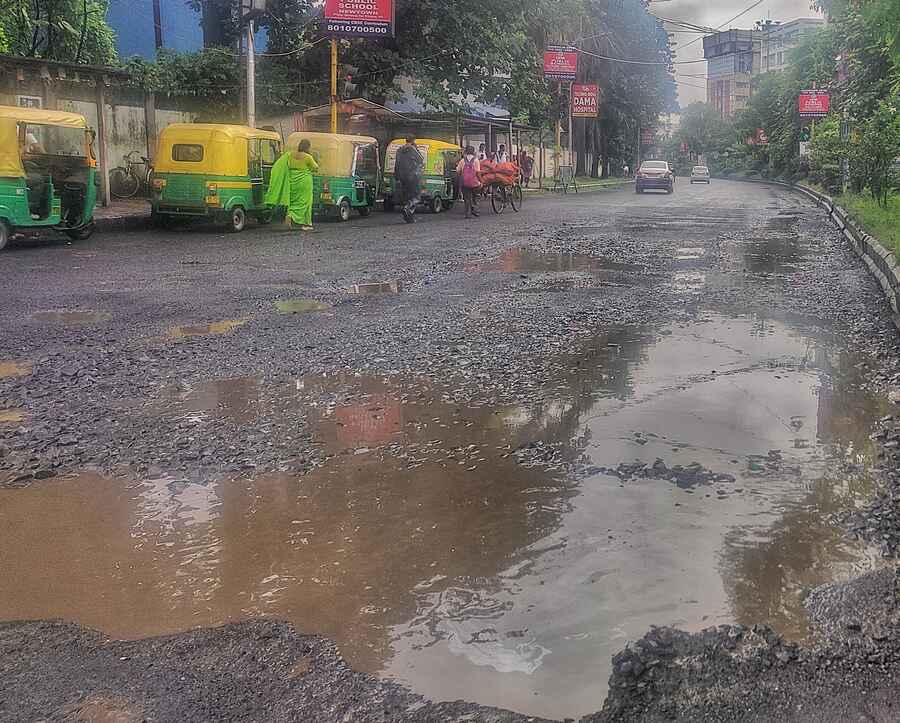 The Eastern Metropolitan Bypass near the Beleghata CIT  buildings has developed potholes owing to the intermittent rain over the past few days