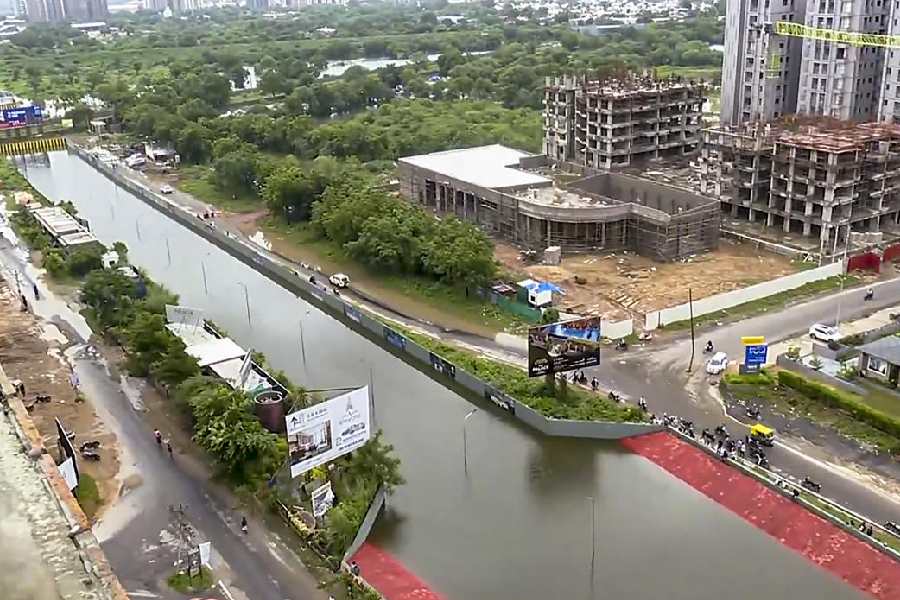 A flooded SP Ring Road underbridge after heavy rainfall at Tragad area, in Ahmedabad, Wednesday, Aug. 28, 2024.