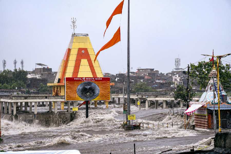 Waterlogging at Ramnath Mahadev temple after heavy rains, in Rajkot, Tuesday, Aug. 27, 2024. 